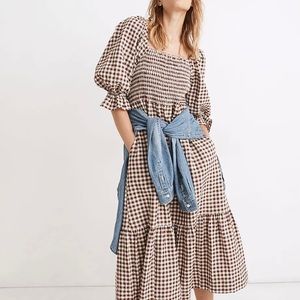 Madewell smock midi dress. I’m a size 2/4. This dress will fit 4-6.